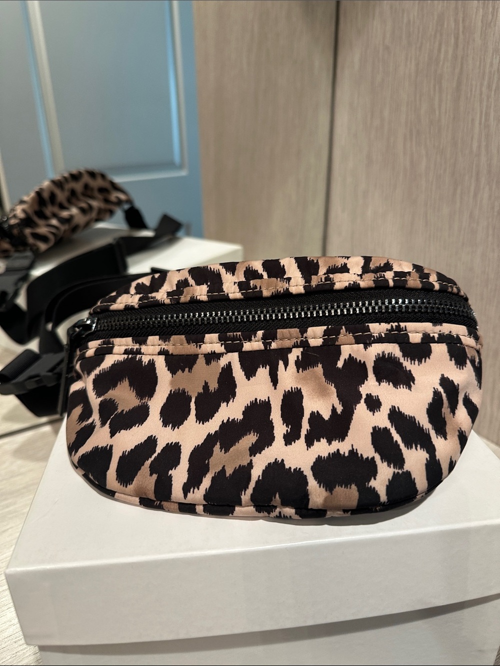 Kate spade nwot animal print
 Crossbody Belt Bag - Black and Tan